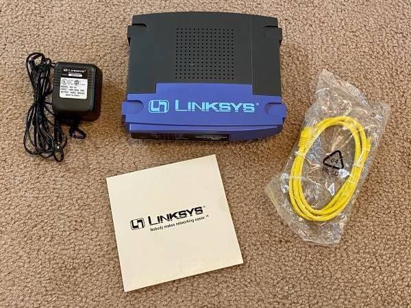 Working Linksys Etherfast Router With 4 Port And AC Adapter Cable BEFSR41 v.2 With CD Included