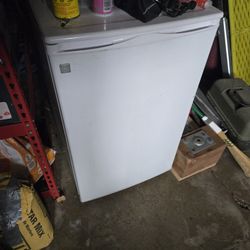 White Mini Fridge. 
