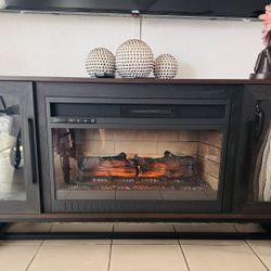 “Mueble de TV con chimenea eléctrica”