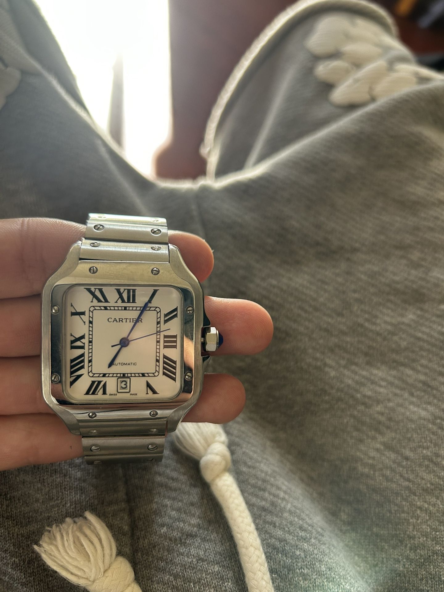 Cartier watch blue gem