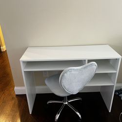 White Desk And Light Blue Swivel Chair 