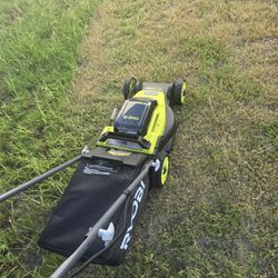 Several Ryobi Lawn Mowers