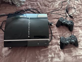 Sony PlayStation 3 Console with Two Controllers