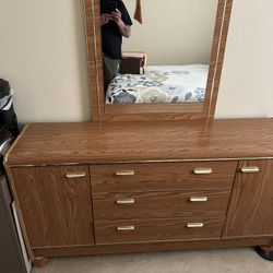 Chest of drawers and mirror