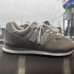 Reflecting new balance classic 574 shoes