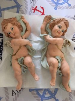 A pair of vintage cherubs 👼