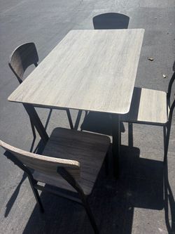 Dining Table and 4 Chairs Set( table around 2 by 4)