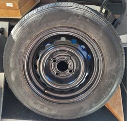BRAND NEW RIM AND SPARE TIRE 185/70R14