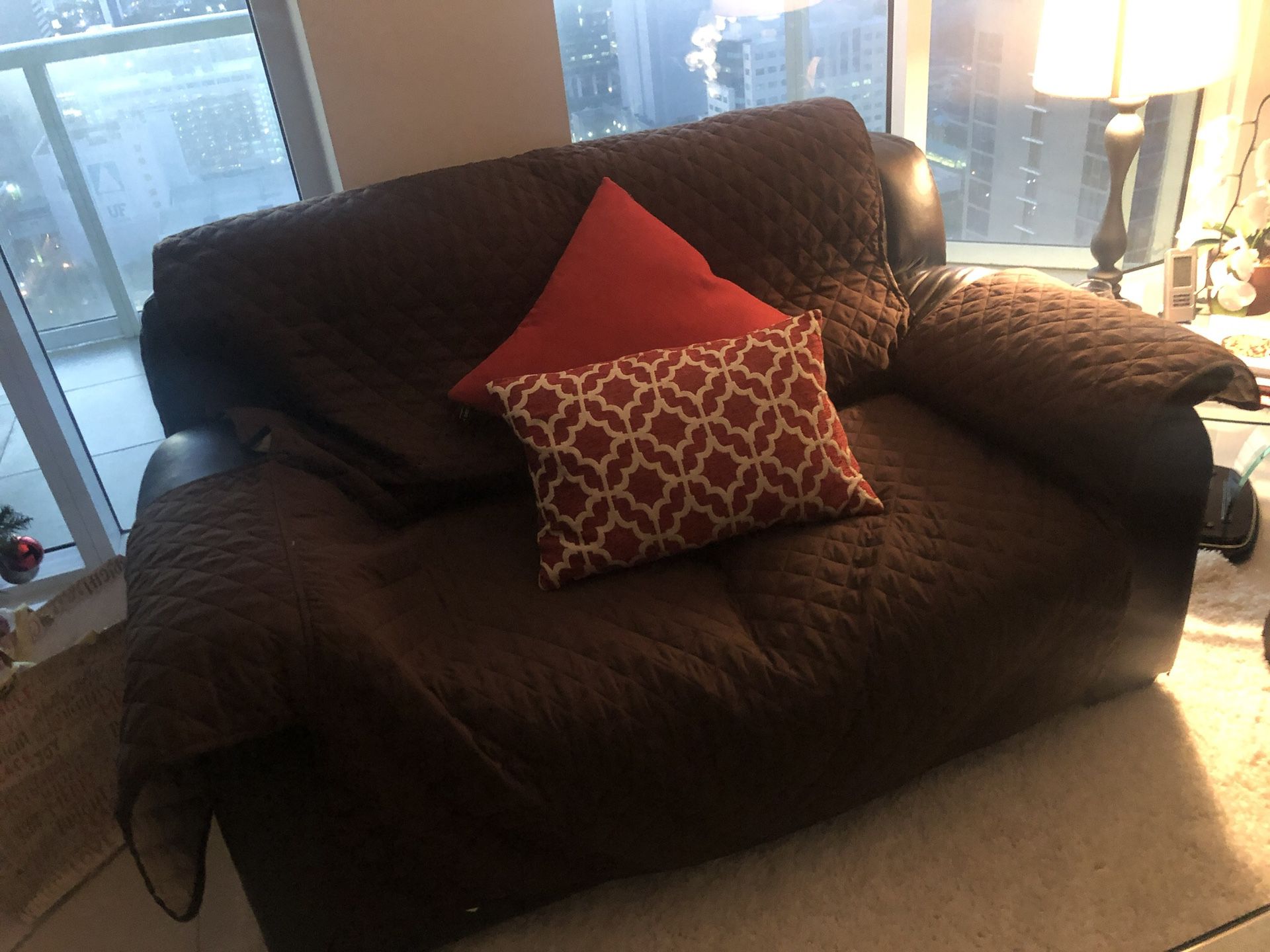 FREE-leather couches with covers and pillows