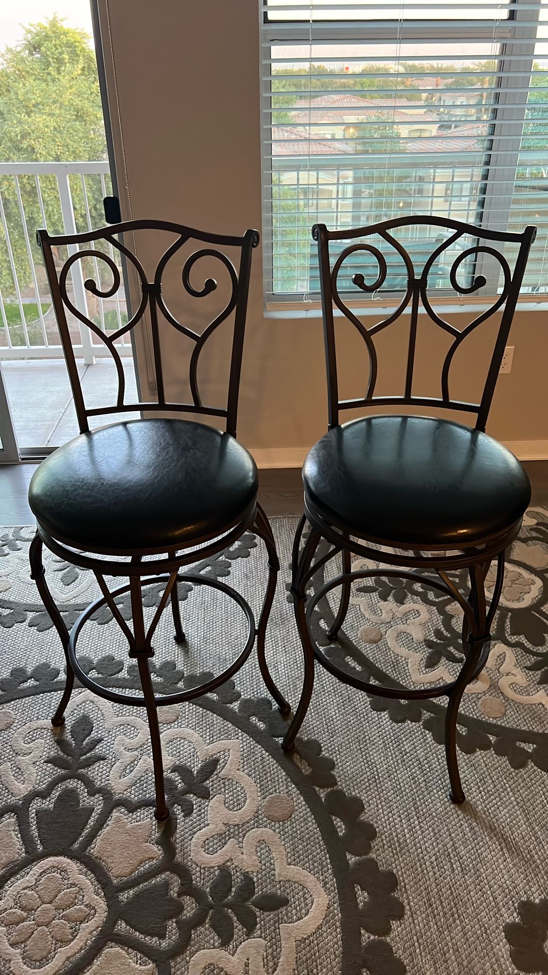 Pair of Elegant Black Swivel Bar Stools - Like New!