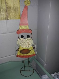 Very cute tin elf candle holder