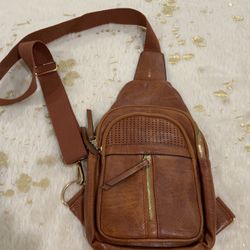 Leather sling bag.   Medium size.   Like new.  Smoke free home. No holds. No shipping. 