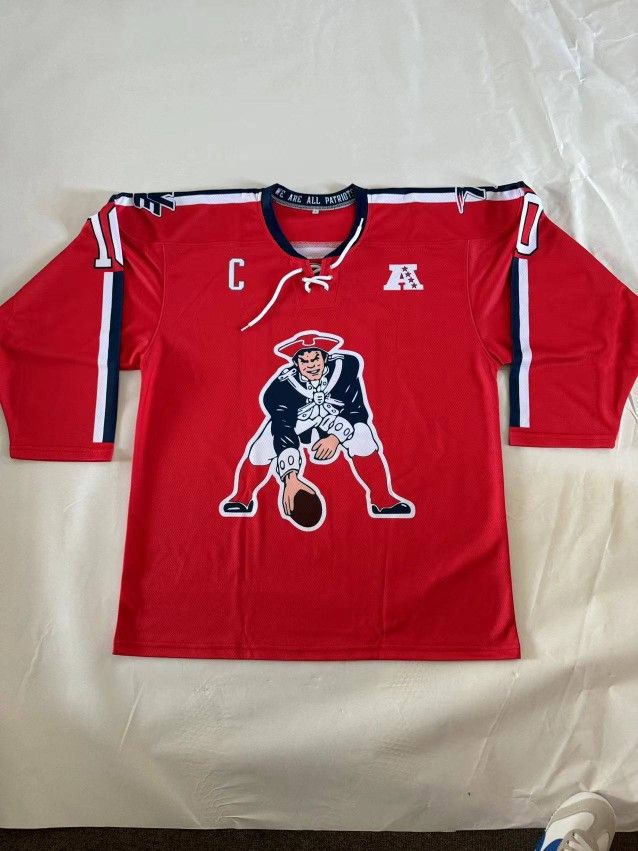 Brand New Marcus Jones Red Patriots Hockey Jersey Adult LARGE #10
