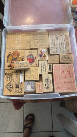 Stamps In A Plastic Container