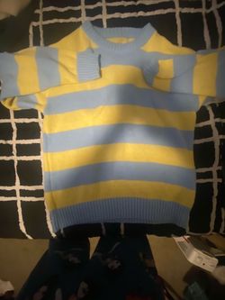 blue and yellow striped sweater