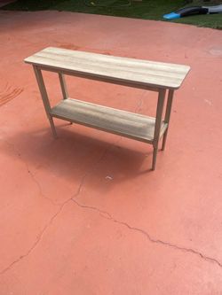 Table 30 inch tall 47 inches long 13 inches wide