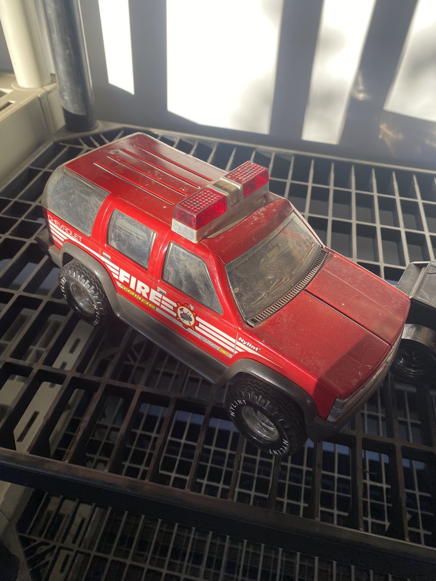 I am selling a standard-sized collectible fire truck for $25, the price is firm, it is complete and in good condition.