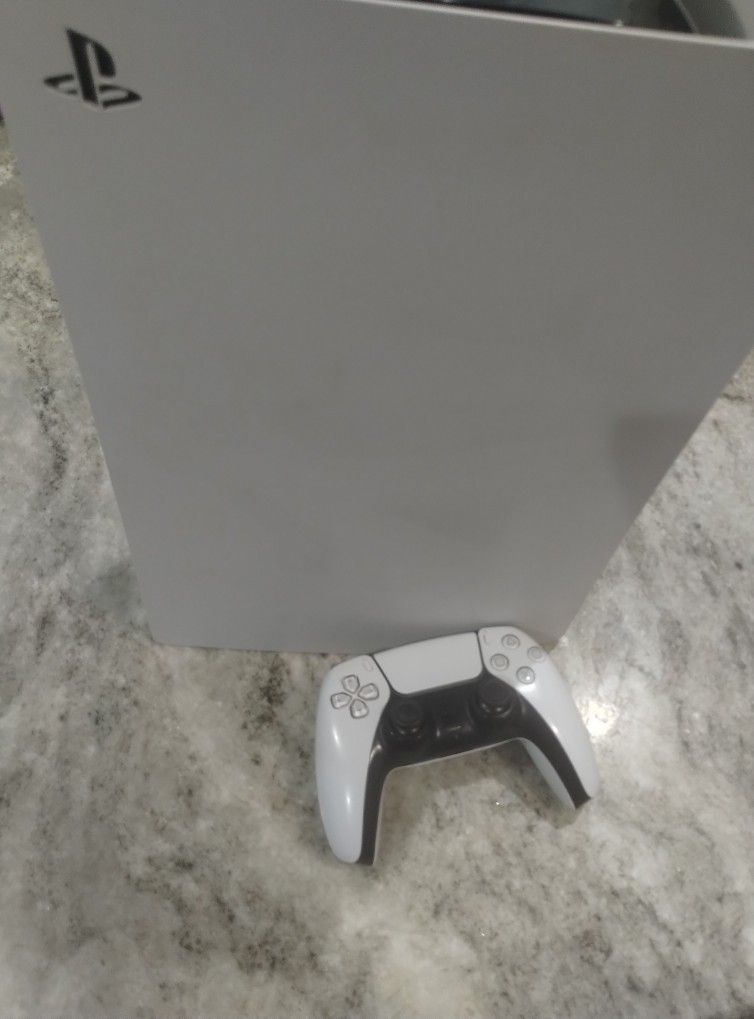 PlayStation 5 - PS5 + a Controller + 9 Funko Pops