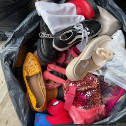 A Few Bags Of Clothes Including Clothes For Children And Adults, Men  Jackets , Many Shoes, Some Snickers, Many Covers …..( NO SHIPPING)