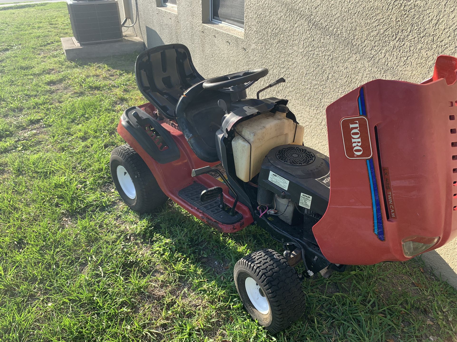 Toro LX 425 Twin Cam Riding Mower Sold as Is(PLEASE READ DESCRIPTION