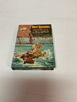 Vintage 1957 hardcover children's western novel titled Roy Rogers and Dale Evans in River of Peril.