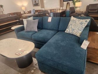 Modern, Mid Century inspired sectional in deep teal color.  Reversible Chaise!