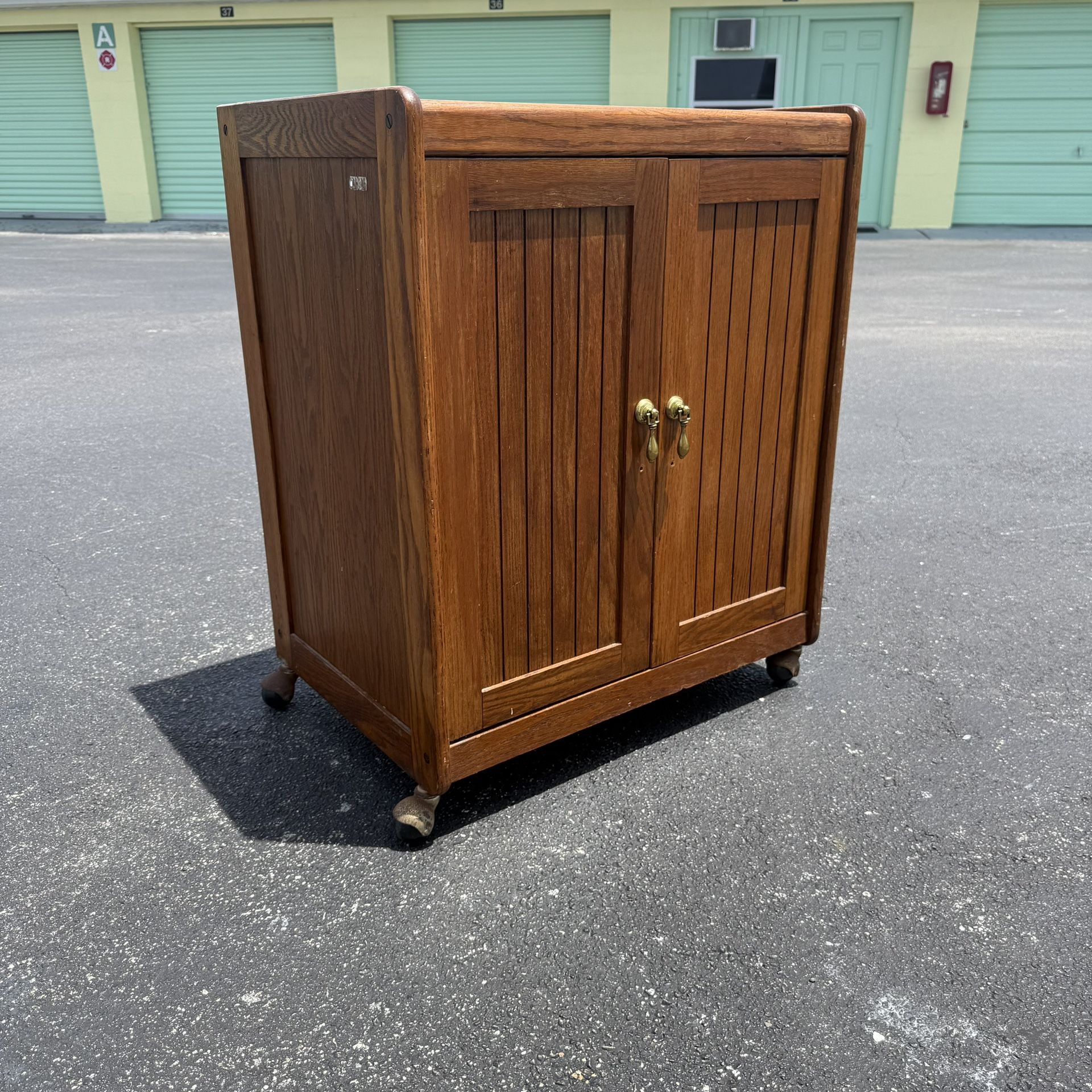 Vintage Wooden Storage Cabinet On Castors