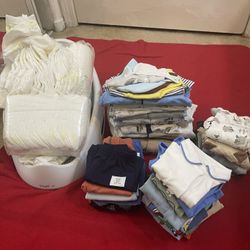 Baby boy clothes, used but in good condition, size 1/9 months, bathtub and diapers, size 1