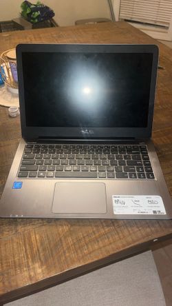 ASUS E403S Laptop Comes With Charger Too