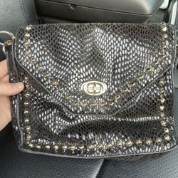 Black Charming Charlie’s crossbody purse..