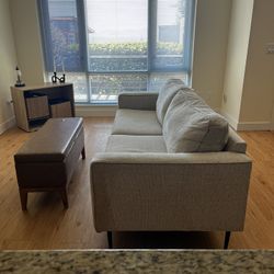 Oatmeal Woven Couch And Cognac Ottoman 