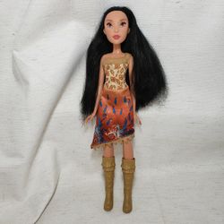 Disney Pocahontas doll 11 1/4" Tall . Good condition and smoke free home. 