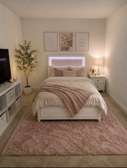 full size bed with mattress and two nightstands