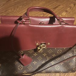 Original brand, Louis Vuitton brown leather used couple times very new good conditions
