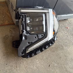 2022 to 2025 GMC Sierra Driver Side Headlight OEM Good Condition 