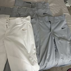 4 Nike baseball pants 2 small 2 medium sizes