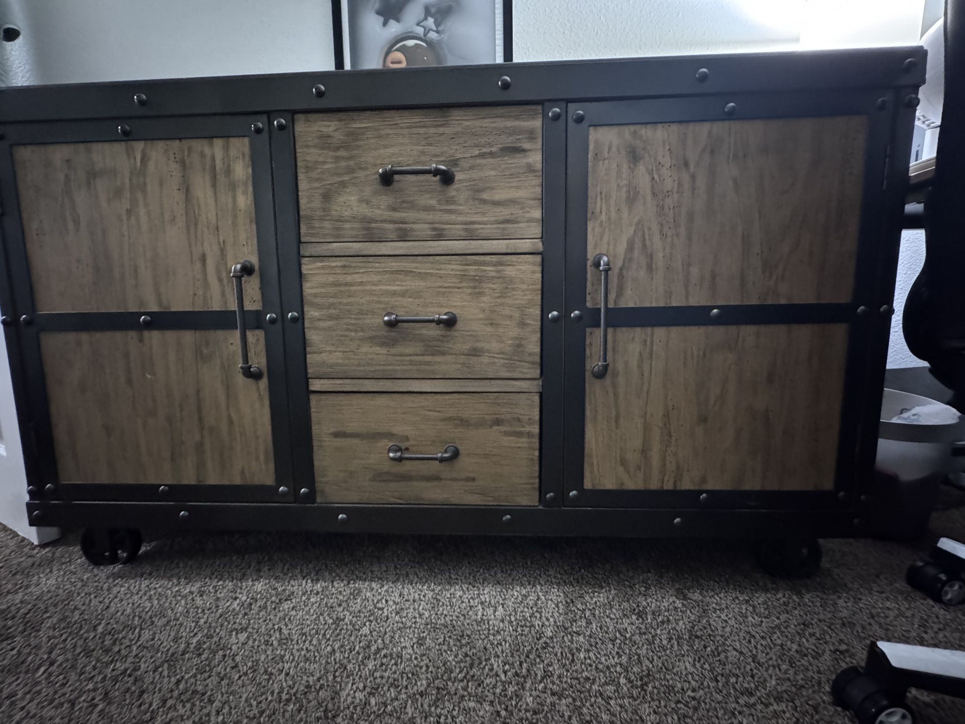 Wooden and black metal dresser