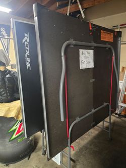 Ping pong table with net and paddles
