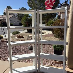 1 MONTH OLD   This item Is a white plastic 4-tier storage shelving unit  Very sturdy excellent condition