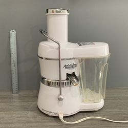 White juicer with a sleek design.
