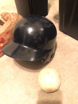 Rawlings baseball helmet with baseball