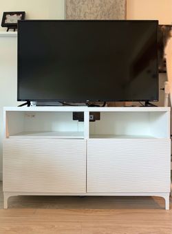 White tv stand with shelves