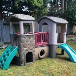 Kids clubhouse with climber and slide