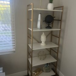 2 matching white/brushed gold shelve units