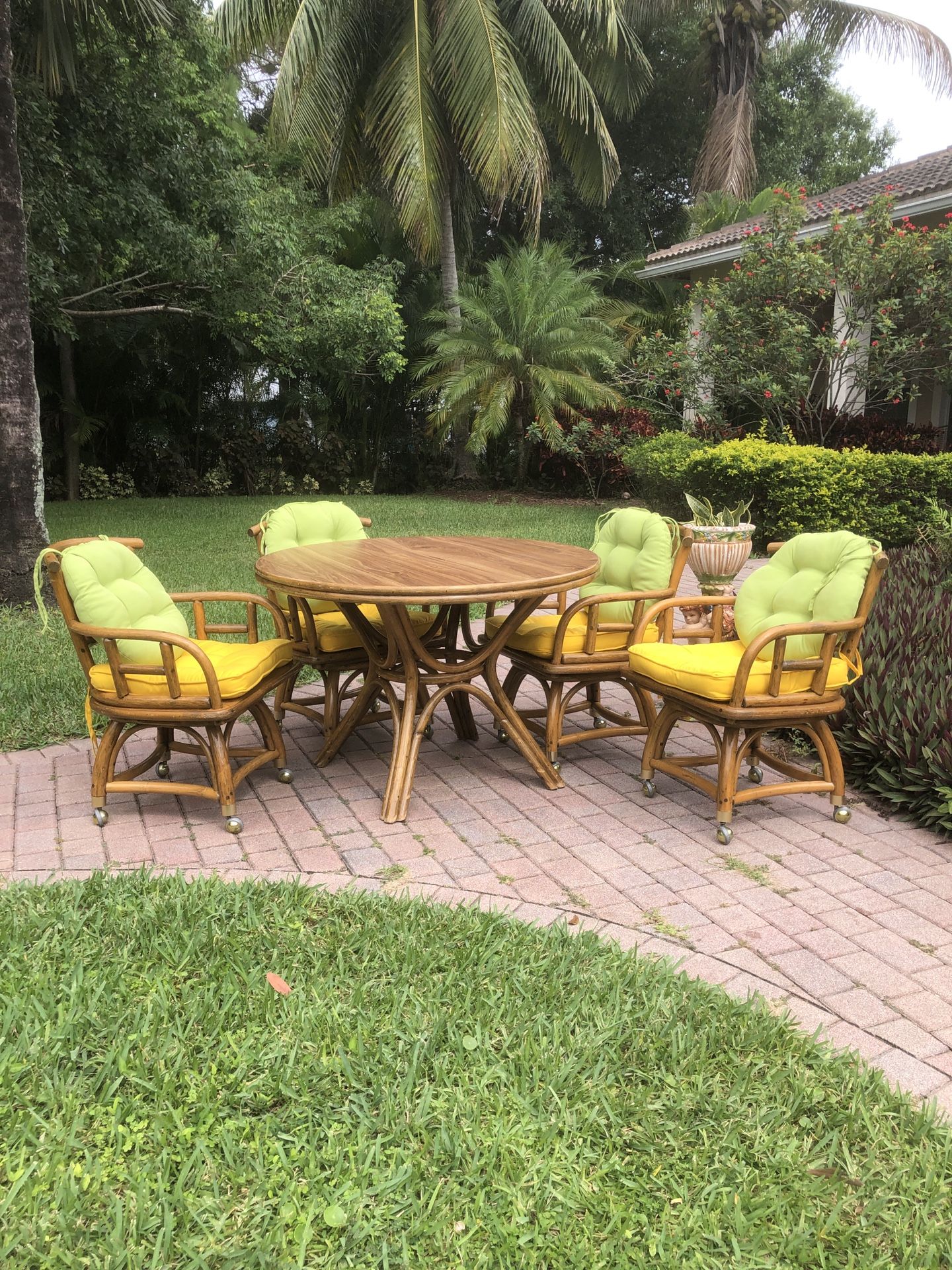1970s Rattan Bamboo Dining Table And Arm-chairs On Wheels - Ficks Reed