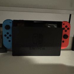 Nintendo Switch + Accessories + Game 
