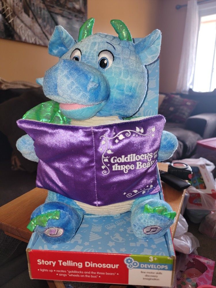 🙂NEW STORY TELLING DINO. MOVES WHEN IT SINGS WHEELS ON THE BUS, AND READS GOLDILOCKS AND THE 3 BEARS