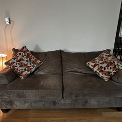 Couch, oversized chair, and storage ottoman set