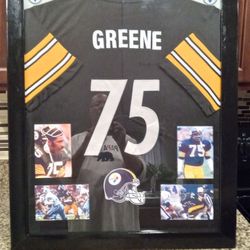 "MEAN JOE GREENE" HALL OF FAMER WITH THE PITTSBURGH STEELERS CUSTOM STITCHED FRAMED JERSEY.