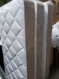 New twin mattresses $120 each